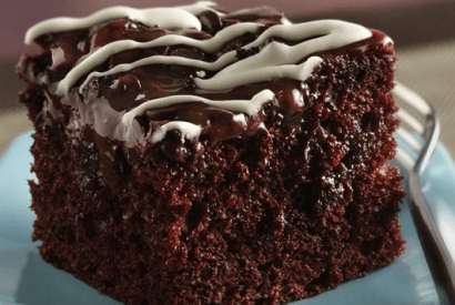 Thumbnail for A Wonderful Chocolate Poke Cake With Chocolate Chips & Caramel