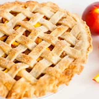 A Classic Peach Pie With A Cinnamon Crumble