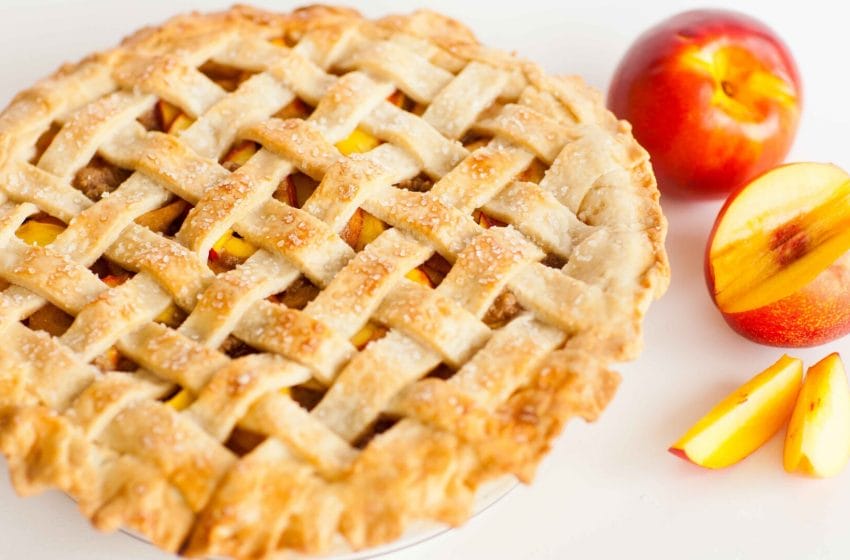 A Classic Peach Pie With A Cinnamon Crumble