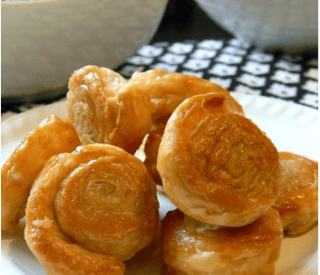 Thumbnail for Sweet Delicious Sugared Cinnamon Puff Pastry Wheels