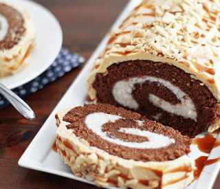 Thumbnail for Chocolate Swiss Roll Cake With Peanut Butter Buttercream Frosting