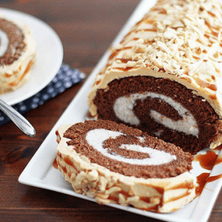 Chocolate Swiss Roll Cake With Peanut Butter Buttercream Frosting