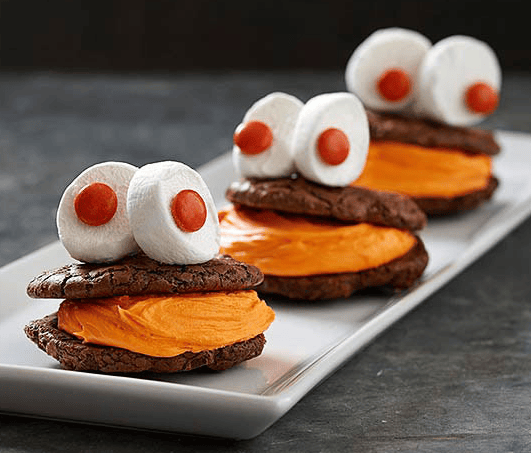 Grinning Monster Cookie Sandwiches One Of Those Fun Halloween Cookie Recipes