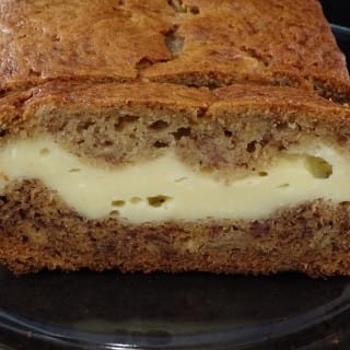 A Delightful Banana Bread With A Cream Cheese Layer