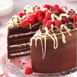 An Indulgent Chocolate Torte With Raspberry Cream