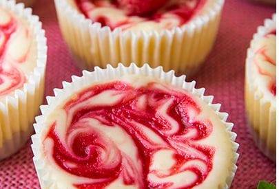Thumbnail for Amazing Raspberry Swirl Cheesecake Cupcakes