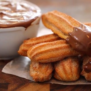 Homemade Baked Churros With A Hot Chocolate Dipped Sauce