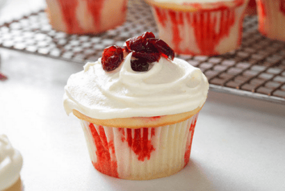 Thumbnail for Fantastic Looking White Chocolate-Cranberry Poke Cupcakes
