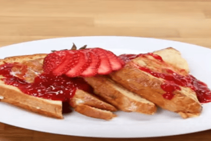 Thumbnail for Totally Delicious Ricotta Chocolate Chip Stuffed French Toast With Strawberry Syrup