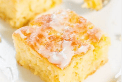 Thumbnail for Love This Pineapple Poke Cake With Pineapple Glaze