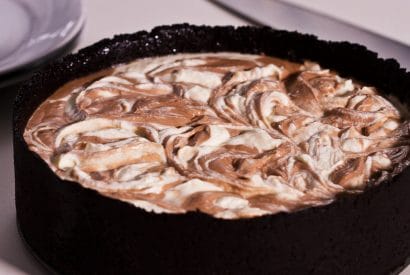 Thumbnail for What A Delightful No-Bake Nutella Swirl Cheesecake