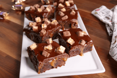 Thumbnail for Love These Snickers Poke Brownies