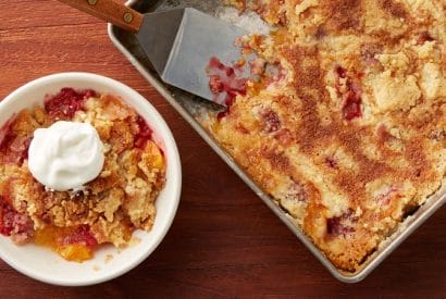 Thumbnail for Yummy Peach-Raspberry Doughnut Dump Cake