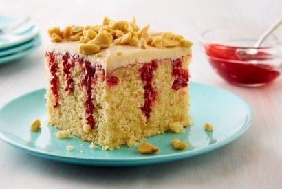 Thumbnail for Yummy Peanut Butter & Jelly Doughnut Poke Cake