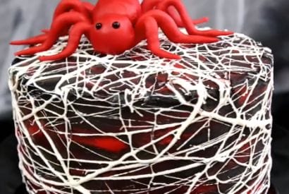 Thumbnail for A Wonderful Halloween Red Velvet Marshmallow Spiderweb Cake