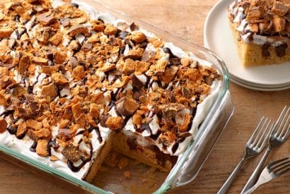 Thumbnail for Bake A Butterfinger Poke Cake You Can Be Proud Of