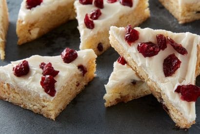 Thumbnail for You Just Have To Make These Delicious White Chocolate-Cranberry Cookie Bars
